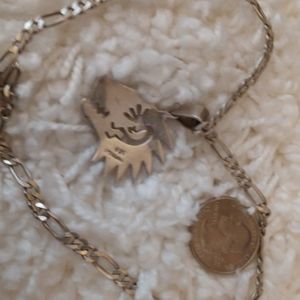 Sterling silver necklace with Navajo wolf pendant